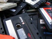 English: A heap of old and unwanted cassette tapes.