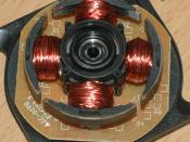 The four poles on the stator of a two-phase BLDC motor. This is part of a computer cooling fan; the rotor has been removed.