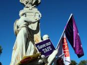 Education union flags and placards on monument