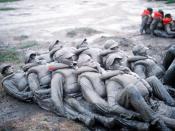 Image of BUD/S trainees covered in mud during Hell Week.