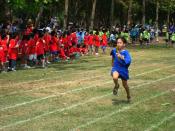 English: Students compete on the Northbridge International School fields for the local International Schools track meet.