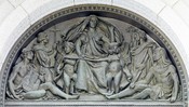 English: Exterior view. Bronze tympanum, by Olin L. Warner, representing Writing above main entrance doors. Library of Congress Thomas Jefferson Building, Washington, D.C. Cropped from the Library of Congress digital version using the GIMP.