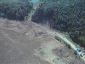 United States v. Zacarias Moussaoui Criminal No. 01-455-A Prosecution Trial Exhibits Exhibit Number P200057 Description - Photograph of the scene in Somerset County, Pennsylvania, where Flight 93 crashed