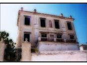 English: An abandoned house on the island of Spetses. John Fowles lived on Spetses for a while, which served as inspiration for the island Phraxos in his novel, The Magus.