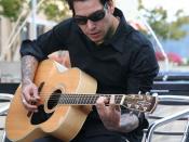 English: Picture I took of Mike Herrera of the band MxPx playing acoustic version of 